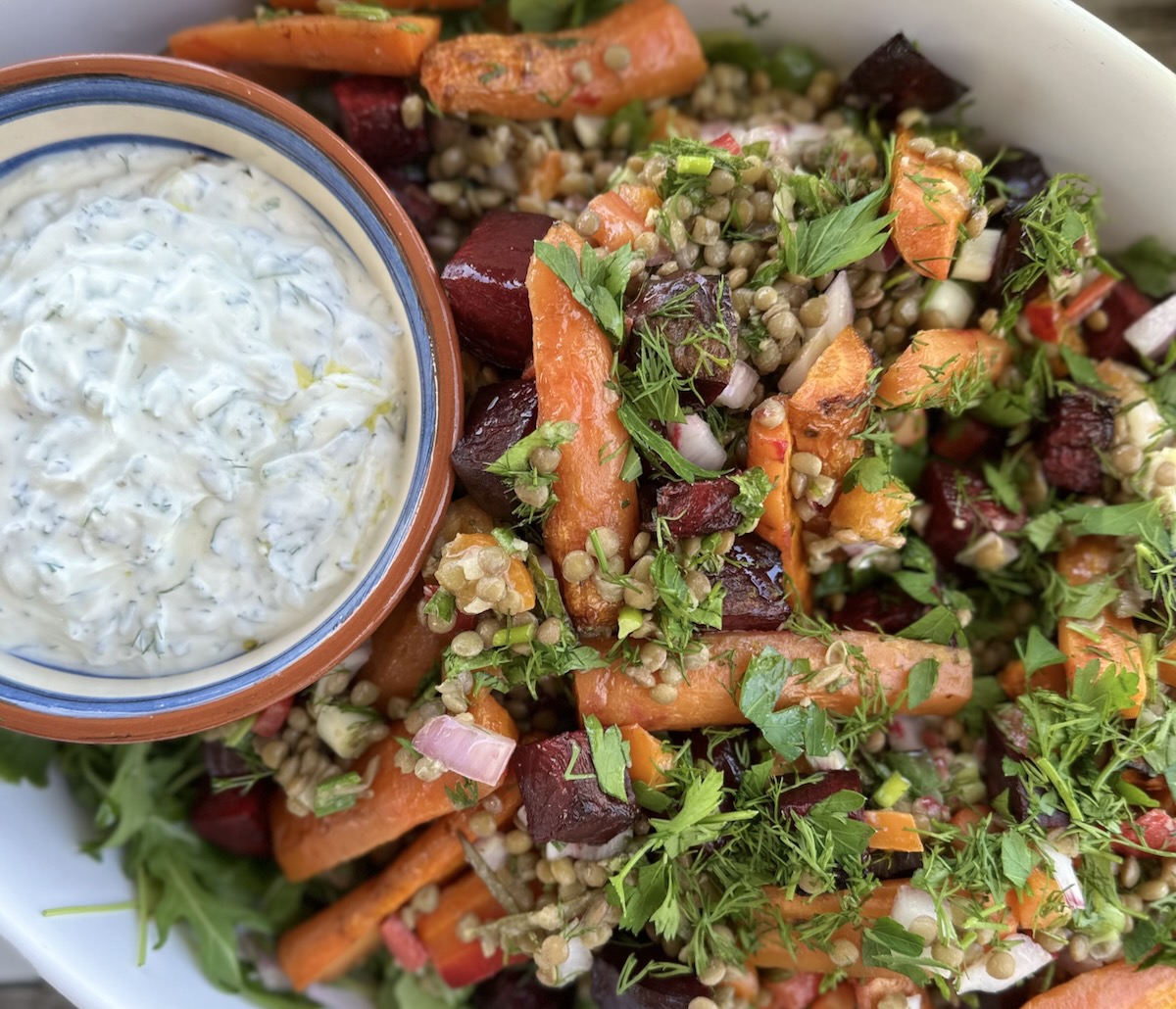 Lentil salad with roasted beets, carrots, and herb yogurt sauce